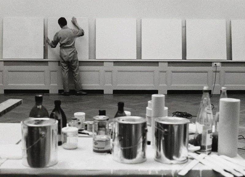 Robert Ryman during the installation of his solo s