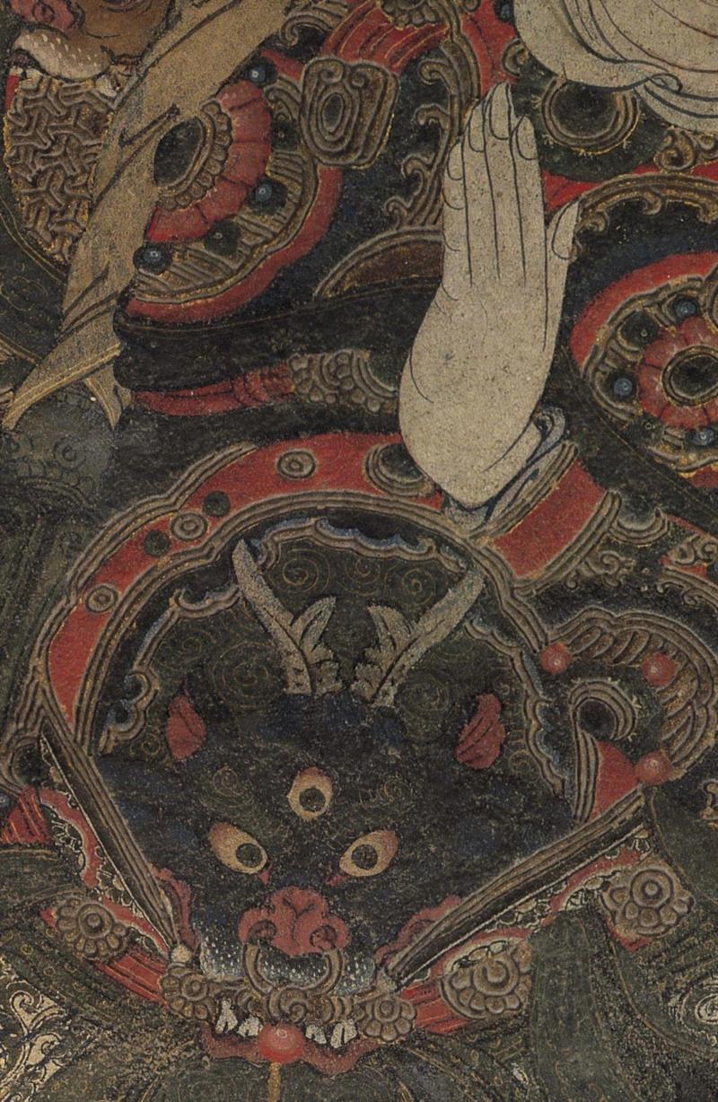 韦陀位于水月观音的右上部。佛寺的守护神，传说又是观音菩萨的护法神，体格魁梧，威武勇猛，面如童子，表示