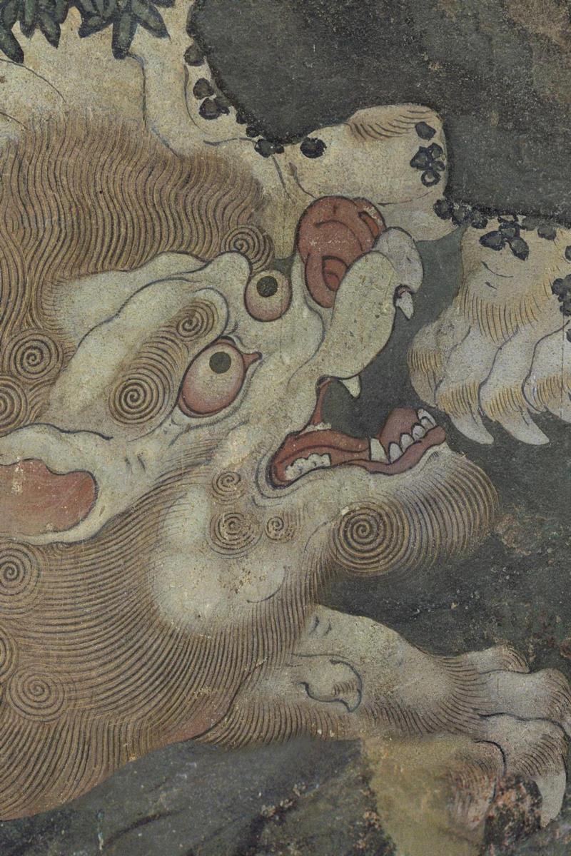 金犼位于水月观音像右下部。观音的坐骑。金犼又叫金毛犼，似犬，凶猛异常，食人，每与龙斗，口中喷火数丈，