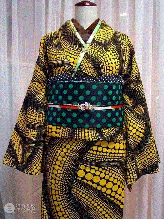 Graphic yellow pattern with a polka dot obi. Kusam
