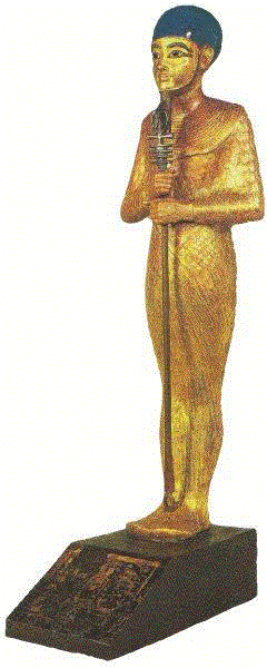 图坦卡蒙墓里殉葬的一尊神像，是在乌木的外部贴满了真金箔制成，头发上镶嵌着青金石。